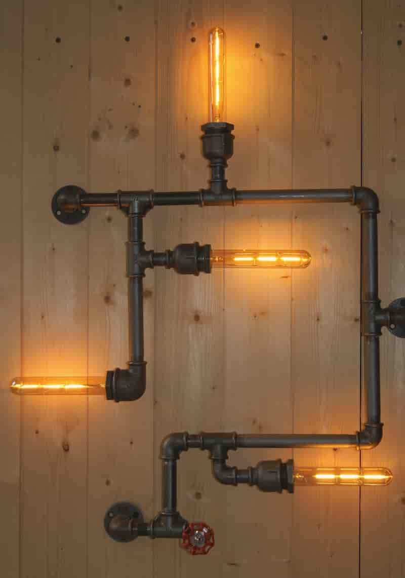 Applique industrielle réalisée à partir de raccord fonte, 4 douilles industrielle